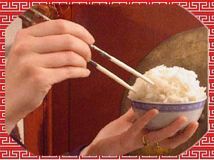 4. And to eat a bowl of rice with rods held in another hand.
